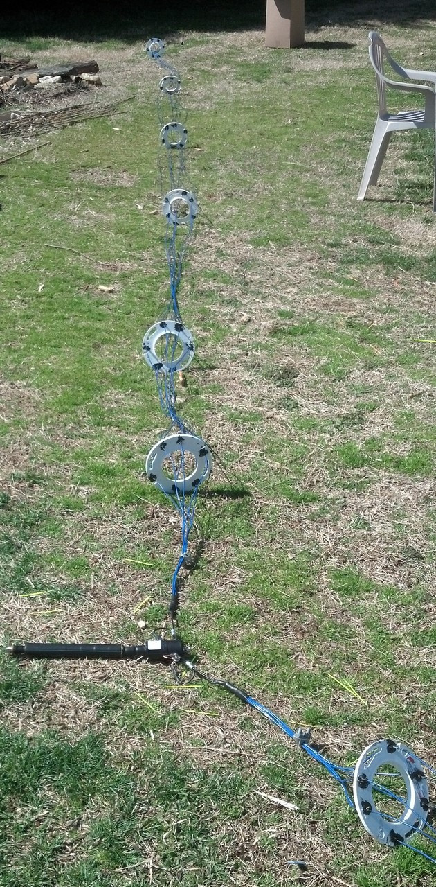 Figure 3 — The multi-conductor cage dipole: parallel wires held at constant spacing by end-to-end spreaders (side view) and forming a circumscribed effective diameter (end view) — the wide-bandwidth answer to…