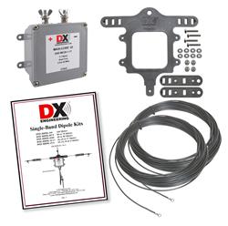 Figure 1 — A DX Engineering single-band dipole antenna kit, the mid-tier commercial answer to this volume's DIY build — pre-cut #14 wire, a Maxi-Core 1:1 balun, and polyresin end insulators in one box. Photo:…
